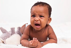 Adorable little african american baby girl crying - Black people